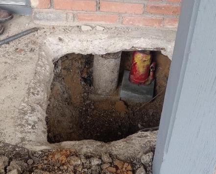 Drainage System Installation — Underground drainage pipe installation with proper access point